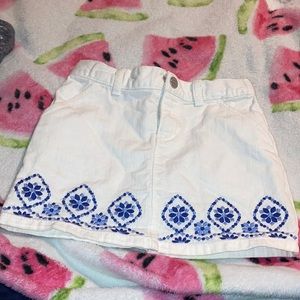 Skirt with blue design on end